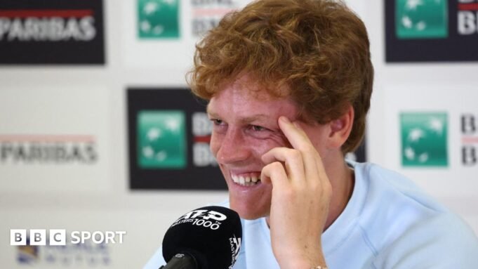 Jannik Sinner speaks at a news conference at the Italian Open