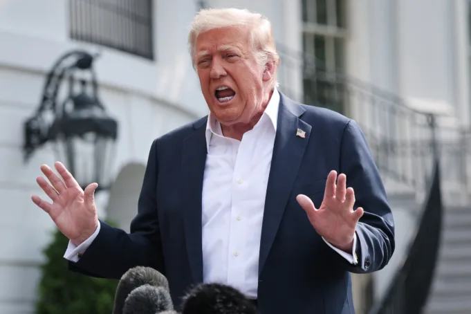 President Donald Trump answers questions