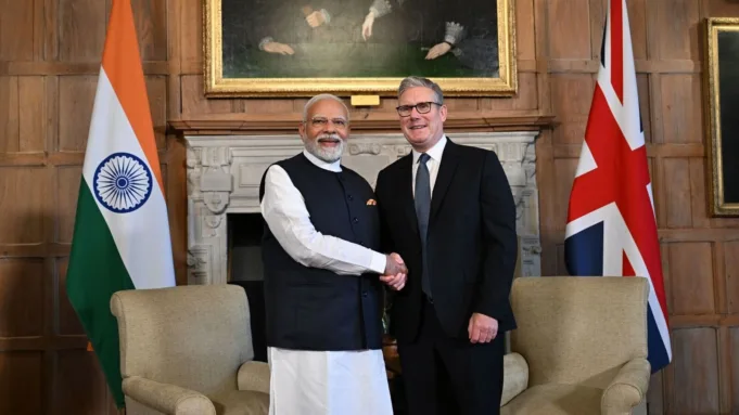 PM Narendra Modi and UK Prime Minister Keir Starmer shake hands before signing the Free Trade Agreement