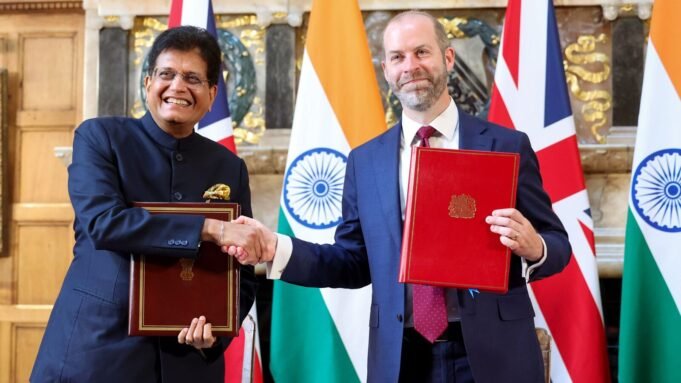 Union Minister of Commerce and Industry Piyush Goyal and Secretary of State for Business and Trade Jonathan Reynolds sign the India-UK Comprehensive Economic and Trade Agreement.