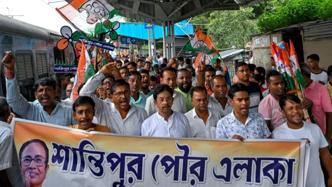 Nadia: TMC supporters raise slogans before boarding a Sealdah-bound train to attend the party's Martyrs� Day rally in Kolkata, in Nadia, West Bengal, Monday, July 21, 2025. (PTI Photo) 