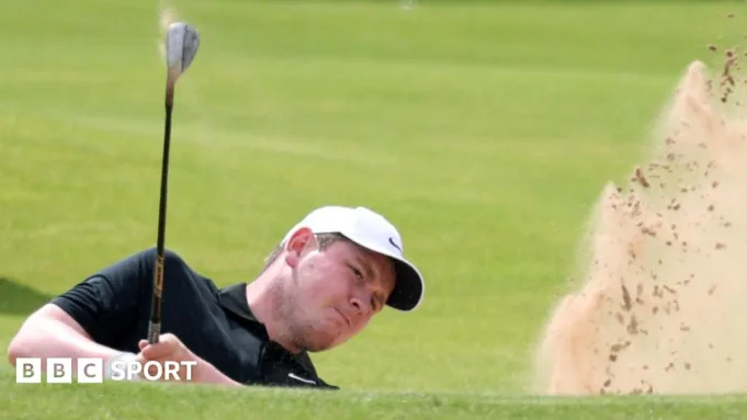 Bob MacIntyre plays a shot out of a bunker