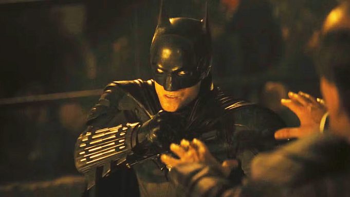 Robert Pattinson's The Dark Knight preparing to punch someone in 2022's The Batman movie