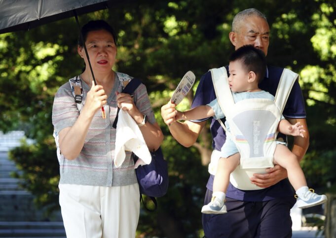 Grandparents and Toddler Viist Hubei Province Park