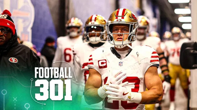 Orchard Park, New York - 1 Desember: Christian McCaffrey #23 dari San Francisco 49ers berjalan melalui terowongan sebelum pertandingan sepak bola NFL melawan Buffalo Bills di Highmark Stadium pada 1 Desember 2024 di Orchard Park, New York. (Foto oleh Kevin Sabitus/Getty Images)