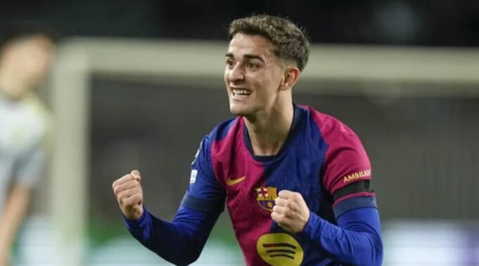 Gavi celebrates on the pitch.