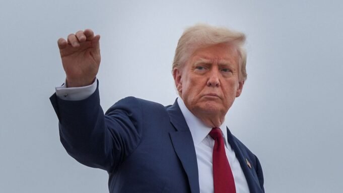 US President Donald Trump boards Air Force One on his way to New Jersey from Joint Base Andrews, Maryland