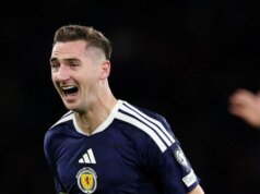 Skotlandia lolos ke Piala Dunia putra untuk pertama kalinya sejak 1998 berkat gol Kieran Tierney dan Kenny McLean atas Denmark di Hampden Park