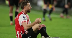 Penghormatan Jota dari Henderson setelah gol liga pertamanya dalam empat tahun