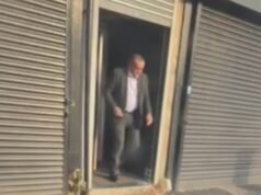 Gubernur penjara yang dilanda skandal dipecat setelah dia difilmkan berjalan keluar dari rumah bordil