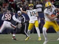 Memulai QB, posisi playoff dimainkan saat Packers menjamu Ravens