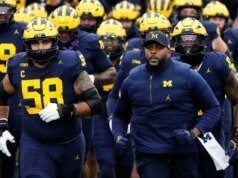 Mantan pelatih Michigan Sherrone Moore masih ditahan