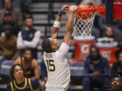 West Virginia mengabaikan awal yang lambat untuk mengalahkan Coppin State