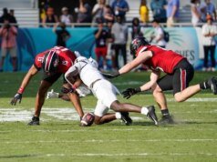Isaac Brown membantu Louisville membangun keunggulan, mempertahankan Toledo di Boca Raton Bowl