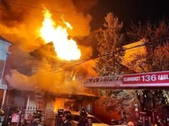 Bayi perempuan kecil yang baru lahir ditemukan tewas di reruntuhan apartemen setelah kebakaran melanda dan membunuh ibunya