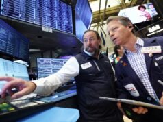 Dow melampaui 50.000 untuk pertama kalinya