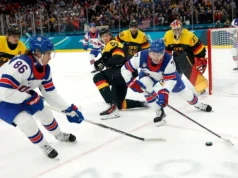 Hoki putra AS menyelesaikan babak penyisihan dengan skor 3 -0 setelah mengalahkan Jerman