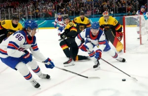 Hoki putra AS menyelesaikan babak penyisihan dengan skor 3 -0 setelah mengalahkan Jerman